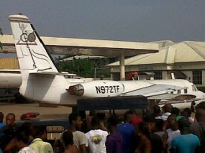 Plane at Igando filling station.jpg